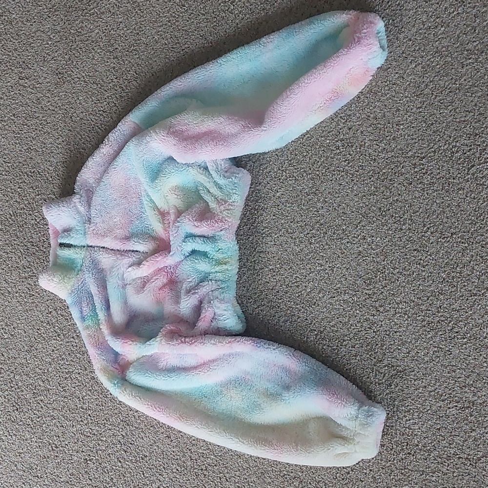 A cropped zip-up sweater